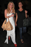 Jessica Simpson in white tight dress shows off her body at Mexican Restaurant in Los Angeles