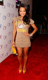 Christina Milian shows legs and cleavage at Op advertising campaign party