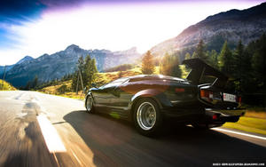 expensive car,door,mirror,magnificent,asphalt,day,clouds,lamps,grass,tires,sun light,space, - 1920x1200 high definition